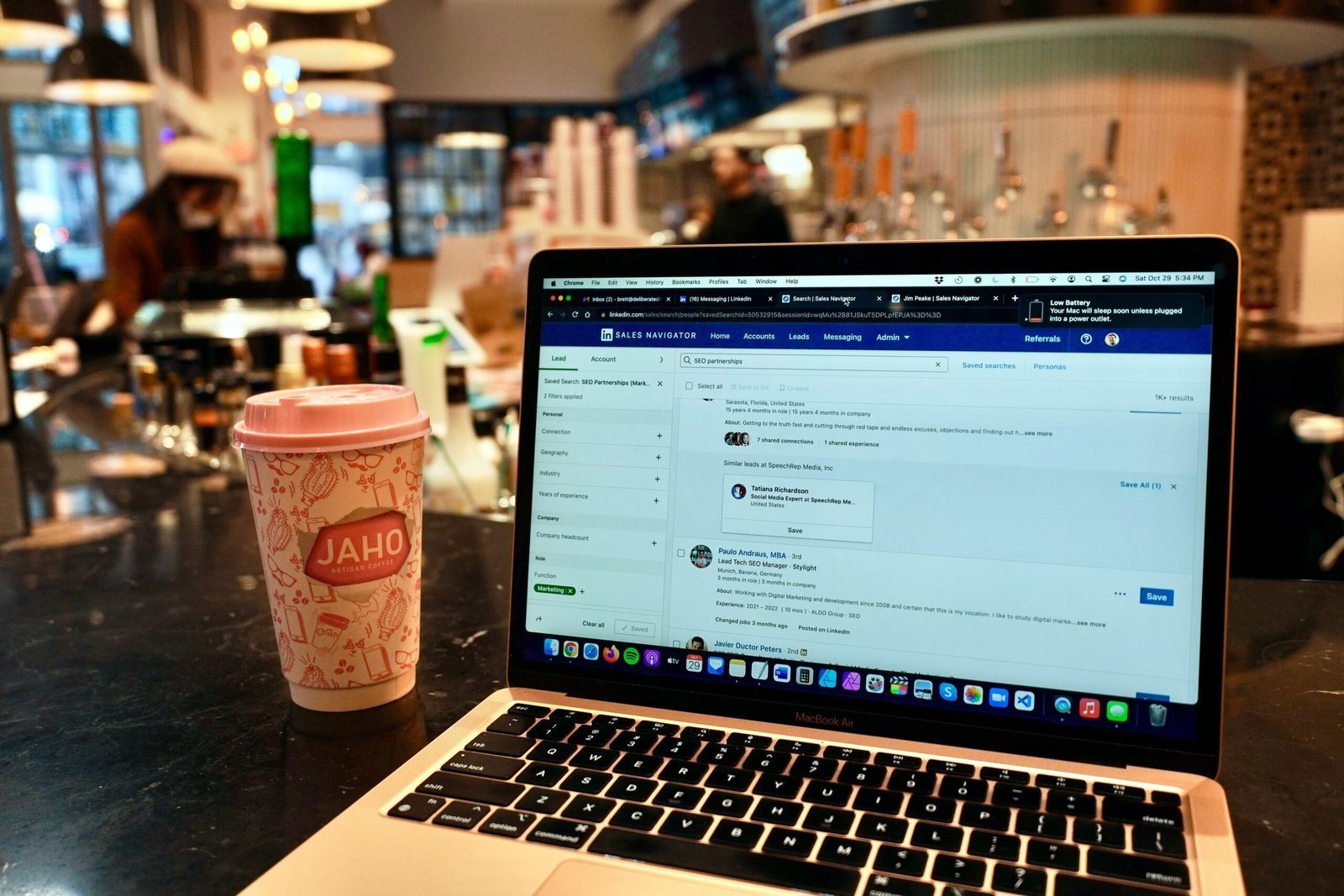 a laptop computer sitting on top of a table