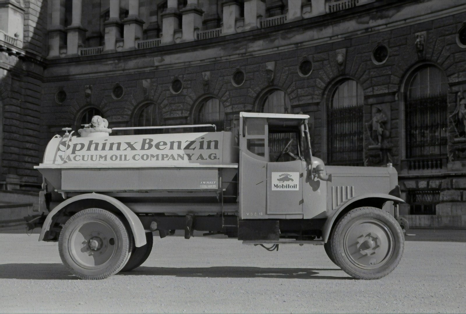 grayscale photo of vintage car